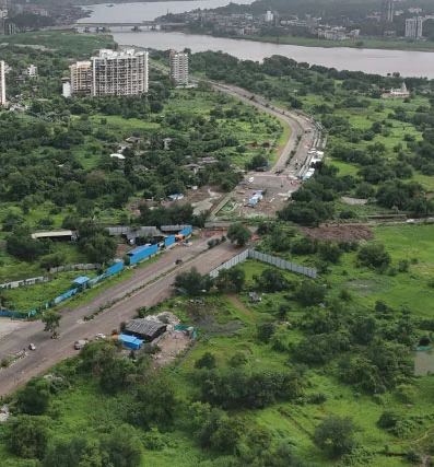 Aerial context of Raunak Earth Park near the Kalyan Ring Road